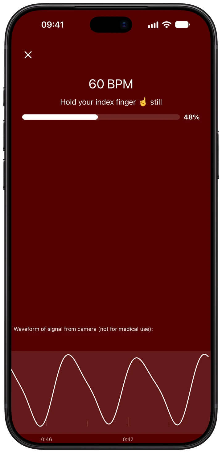 Wellhero camera measurement showing 60 BPM, 48 percent progress, a hold-still instruction and the pulse waveform